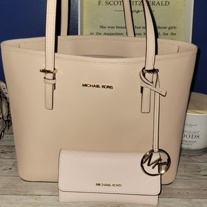 Adorable pink Michael Kors purse with a wallet!